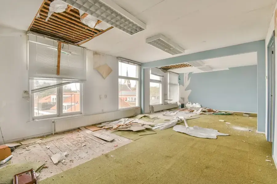 Storm-damaged room cleared and prepped for drying