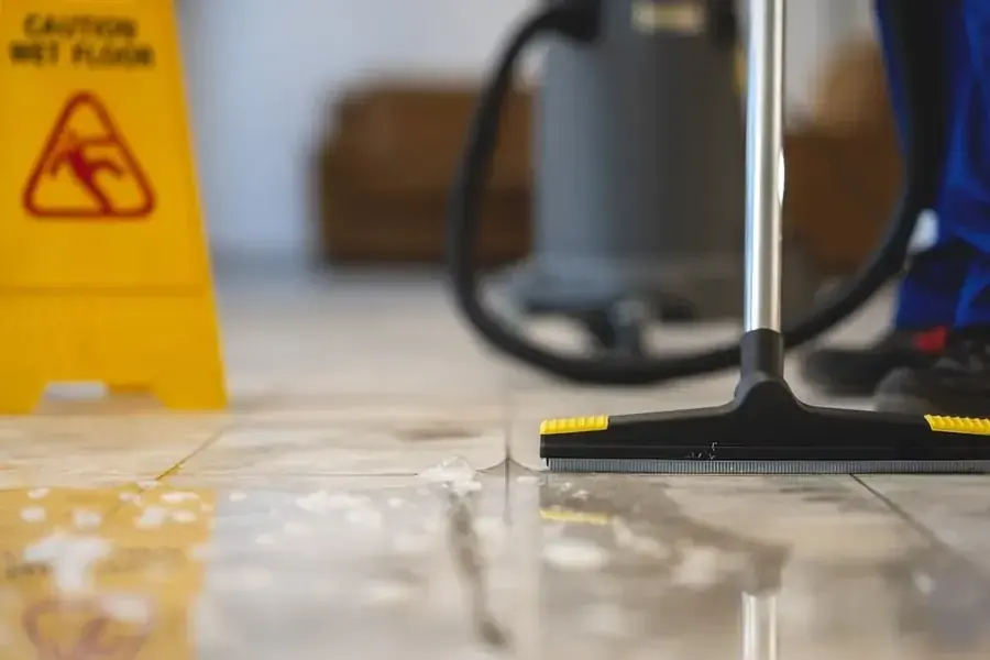 Technician extracting standing water from a Snellville floor